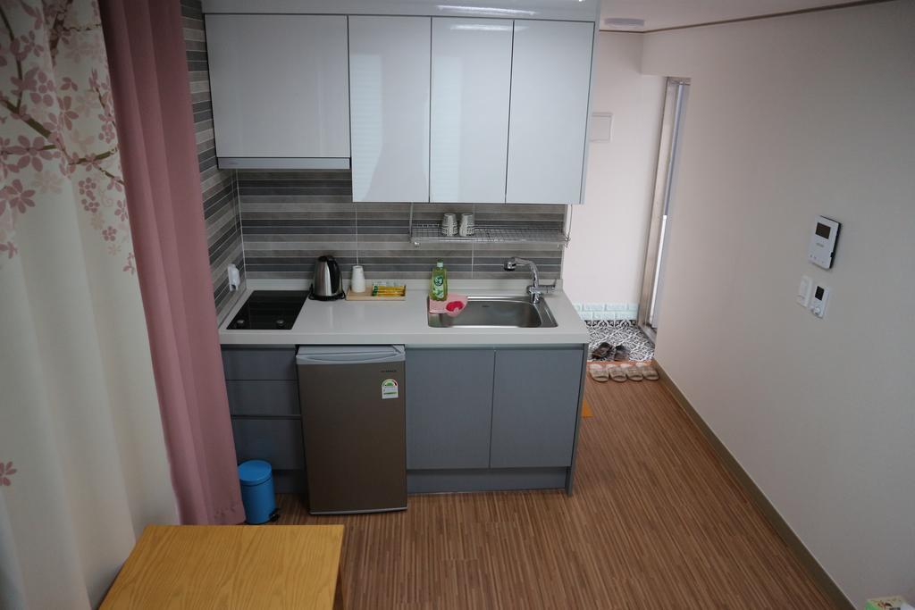 Blue Island Guesthouse Seogwipo-stad Buitenkant foto