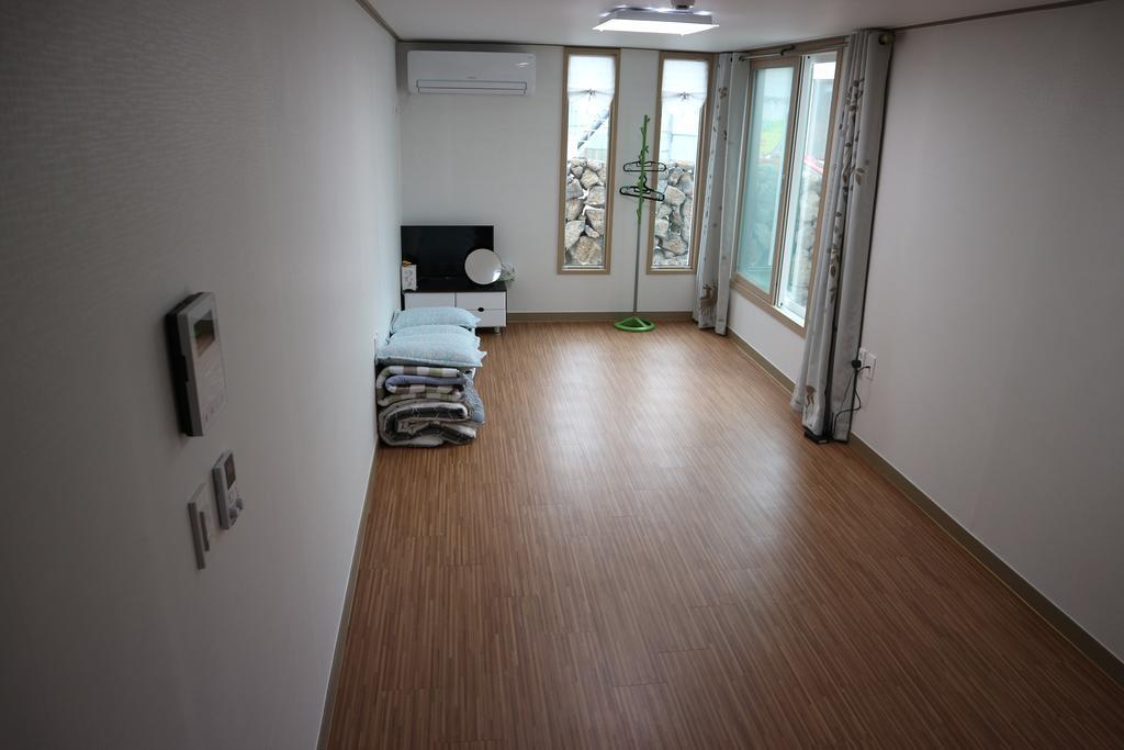 Blue Island Guesthouse Seogwipo-stad Buitenkant foto
